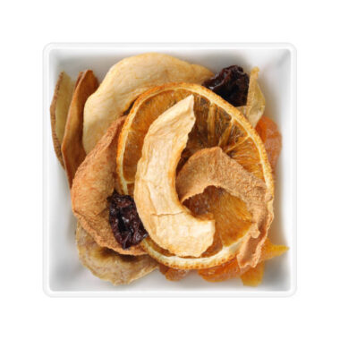 Dried fruit slices in square bowl on white background