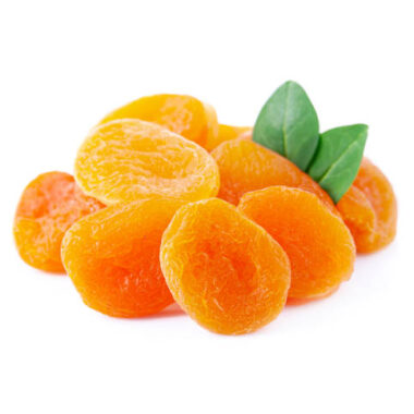 Dry apricots with leaves on white backgrounds.